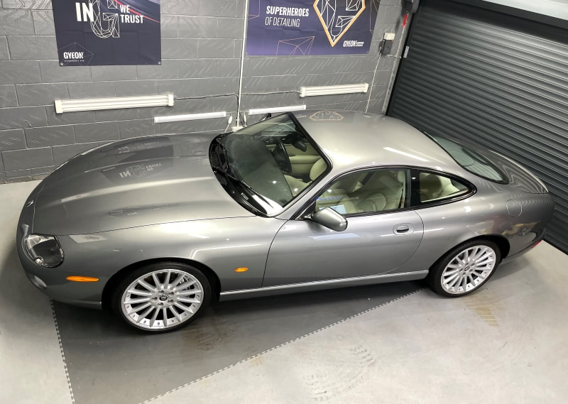 Metallic grey Jaguar XK8 car awaiting collection from Essex based detailing studio.